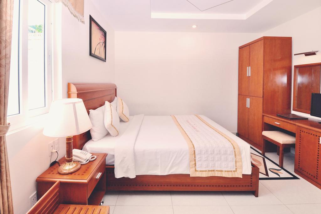 Tan Hoang Long Hotel Ho Chi Minh City Room photo